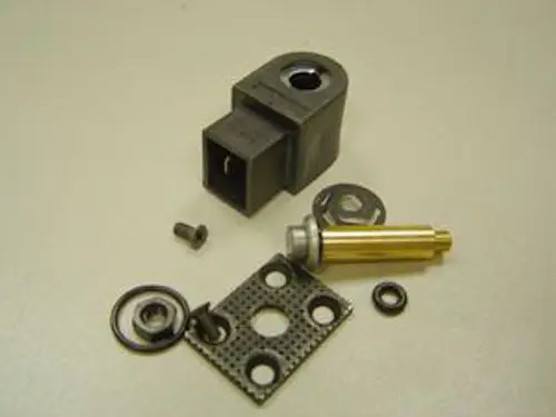 Magnetventil mit mehreren Bauteilen, darunter ein Gehäuse, eine Feder, eine Dichtung und ein elementarer Ventilkörper. Produkte von Remeha sind oft mit solchen Komponenten ausgestattet.